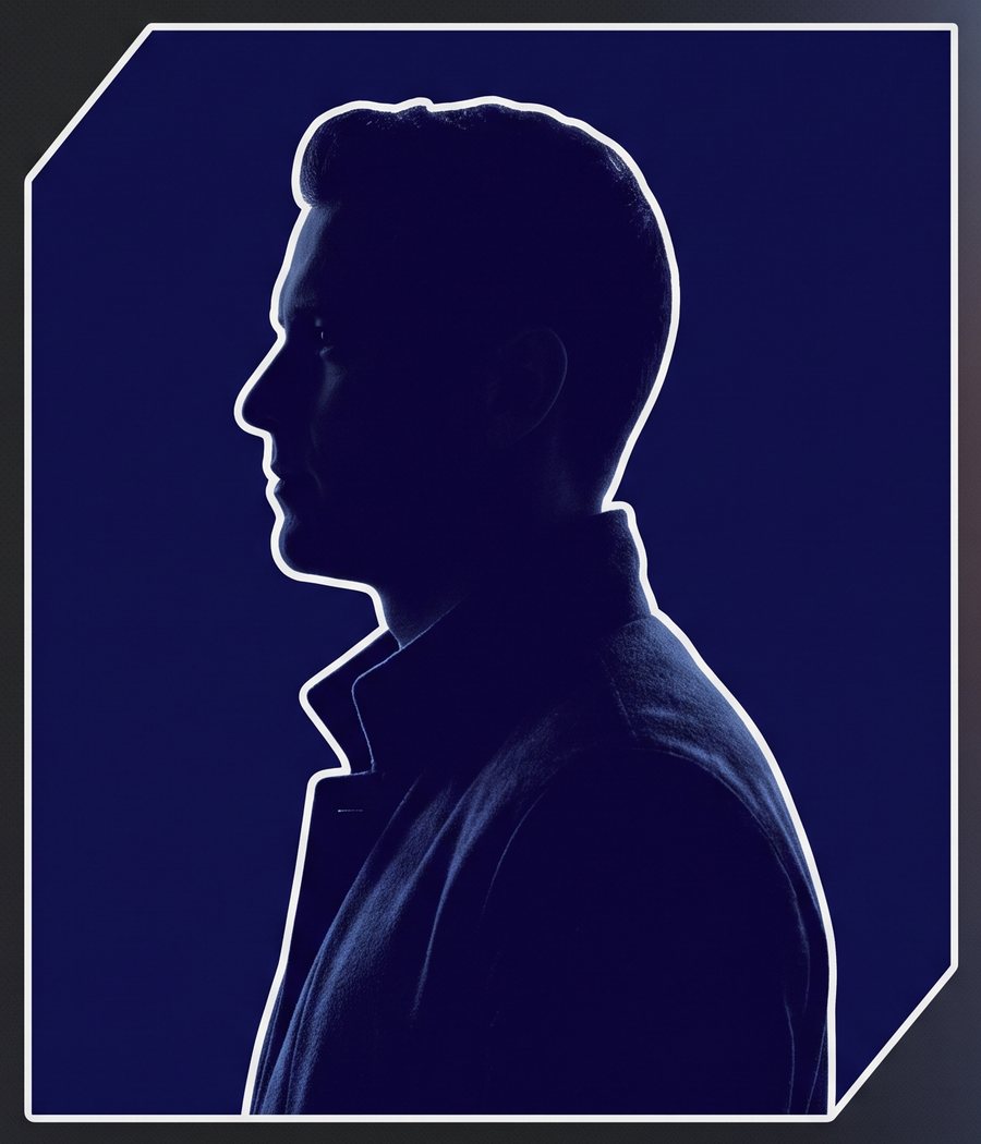 Darrell Donaghy in profile, a navy silhouette portrait.